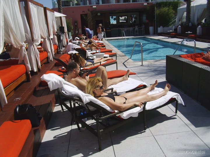 Trashy people tanning at w hotel hollywood pool side